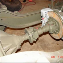 Halftrack front axle and hub assembly close-up
