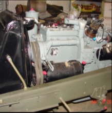 Halftrack engine installed in vehicle with hood open