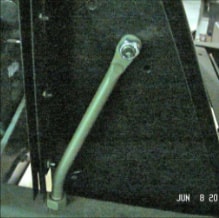 Halftrack steering rod detail showing ratchet wrench for adjustment