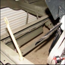 Halftrack interior floor and seat rail assembly