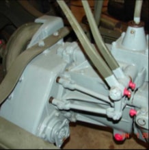 Halftrack transfer case and brake linkage assembly detail