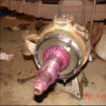 Halftrack front hub assembly with pink bearing grease on spindle