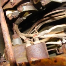 Corroded dash bracket and wiring detail