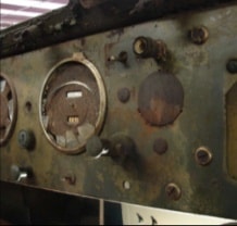 Halftrack instrument panel with circular gauge openings