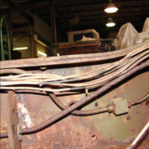 Frame rail with wiring and hardware