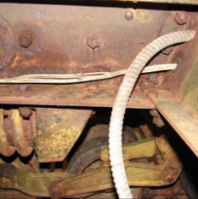 Frame underside with conduit and wiring