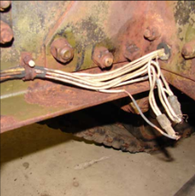 Weathered frame with rope and metal fittings