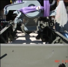 Engine fully lowered into halftrack chassis close-up