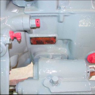 Rebuilt engine closeup with red valves and data plate detail