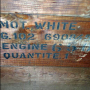Wooden engine crate stenciled MOT WHITE ENGINE QUANTITE markings