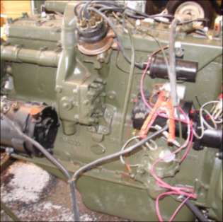 Halftrack engine with wiring harness and components being assembled