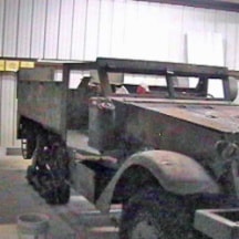 Halftrack side view in warehouse