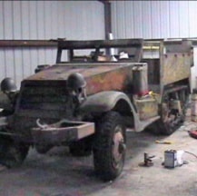 Halftrack front three-quarter view in garage